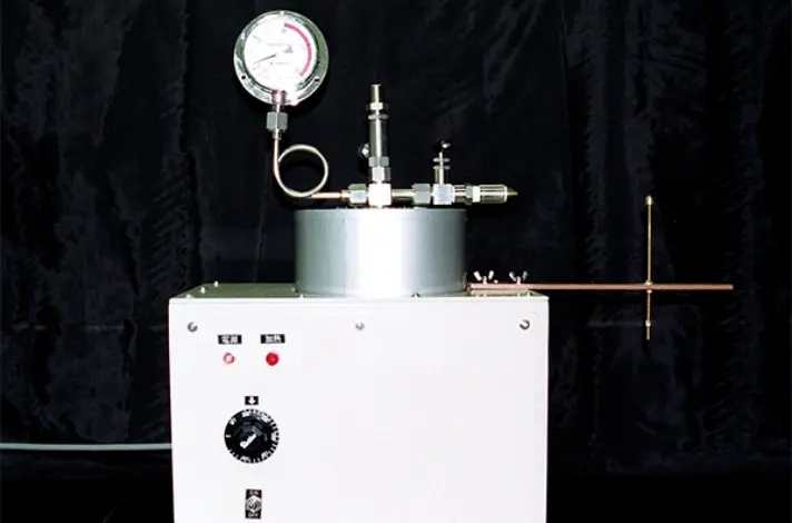 噴出帯電実験装置