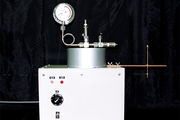 噴出帯電実験装置